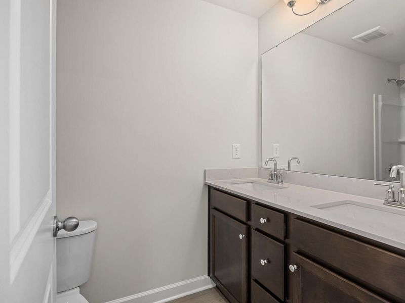 Furnished interior view inside a new home in Retreat at North Main, Lillington (Image 9).