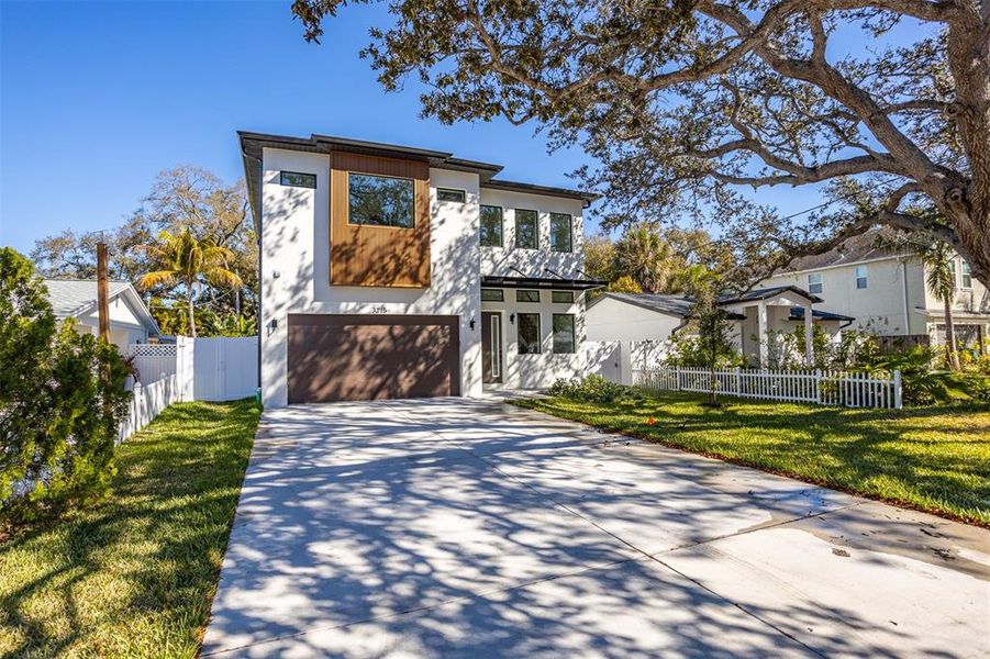 Front exterior of a new home in , Tampa, FL, highlighting curb appeal (Image 23).