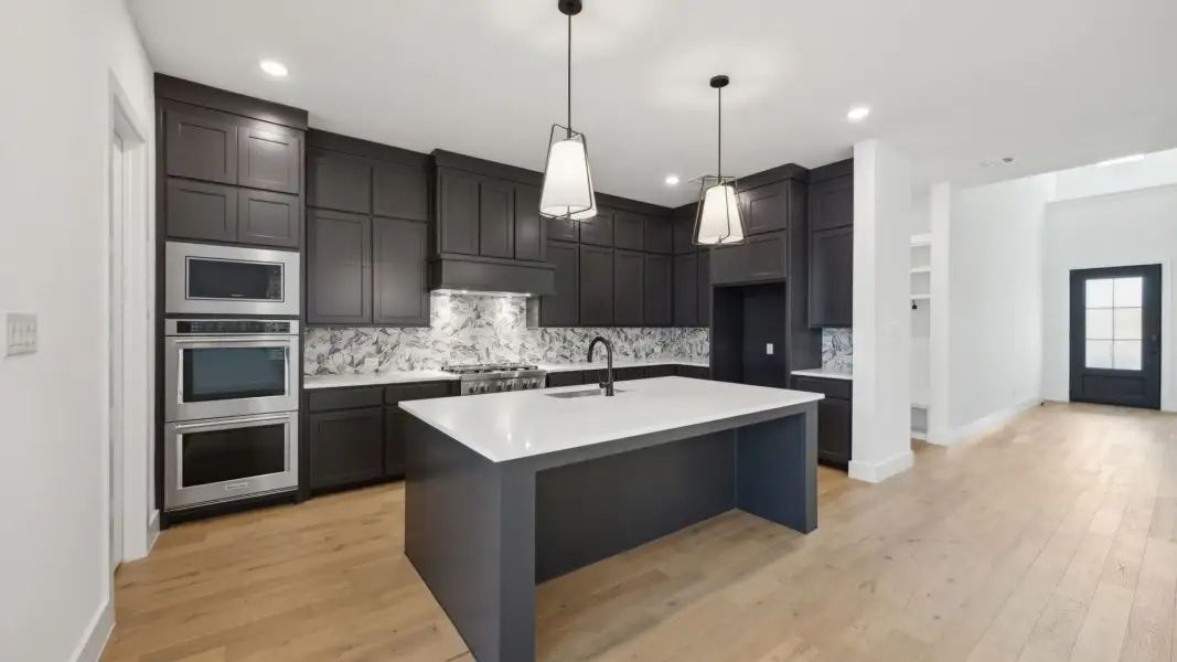 Furnished interior view inside a new home in Painted Tree 50' Series, McKinney (Image 3).