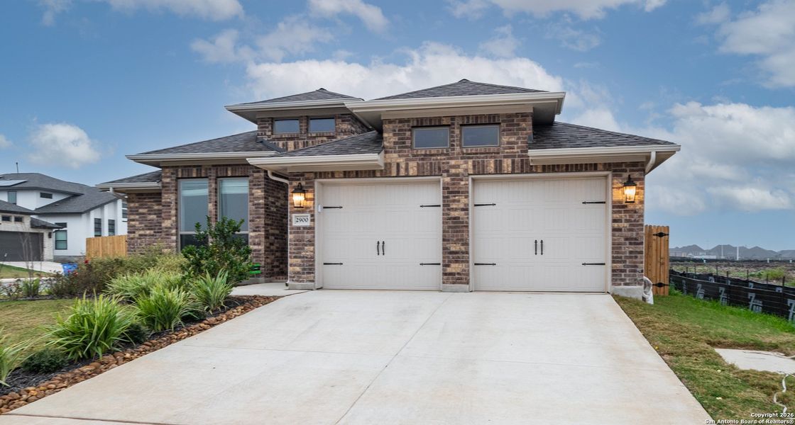Front exterior of a new home in , Seguin, TX, highlighting curb appeal (Image 2). Front exterior of a new home in , Seguin, TX, highlighting curb appeal (Image 2).