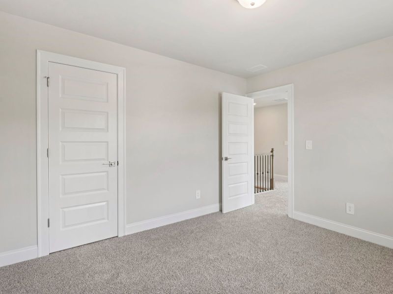 Spacious, unfurnished interior of a new home in Hemingway - Reserve Series, Cumming (Image 18).