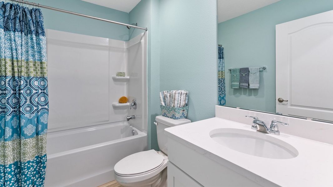 Representative furnished interior of a home built from the DALTON by D.R. Horton in American Village, Palm Coast (Image 18).