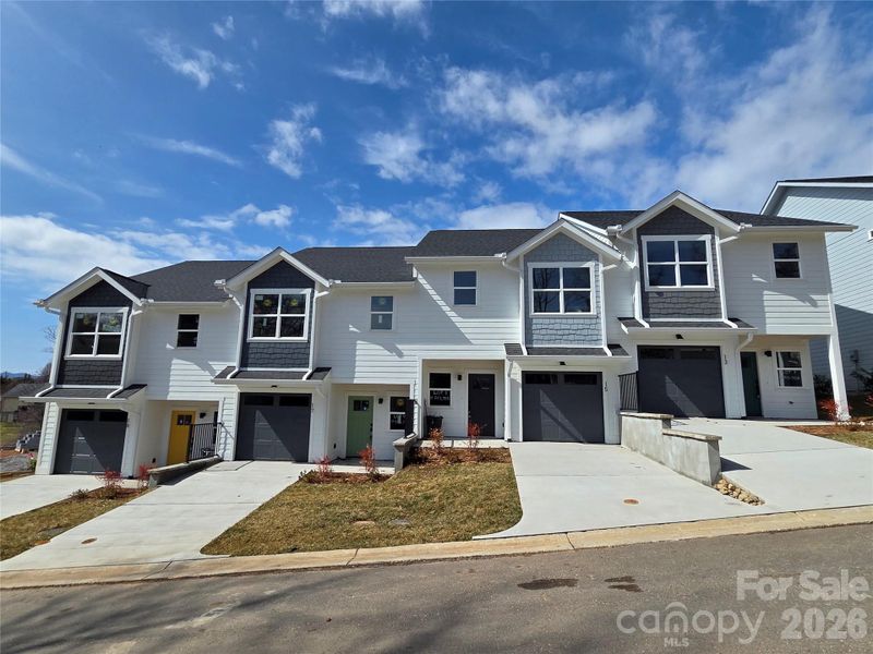 Front exterior of a new home in , Asheville, NC, highlighting curb appeal (Image 16).