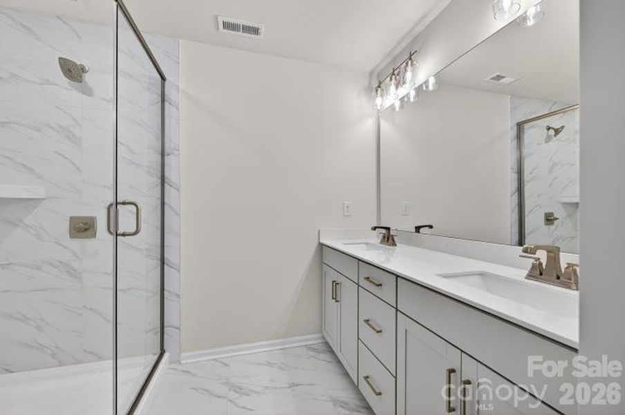 Furnished interior view inside a new home in North Creek Village - Townhomes, Huntersville (Image 6).