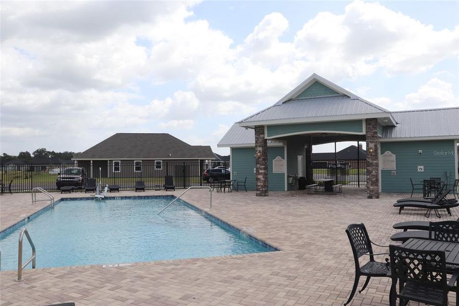 Front exterior of a new home in Countryway Town Square, Newberry, FL, highlighting curb appeal (Image 5).