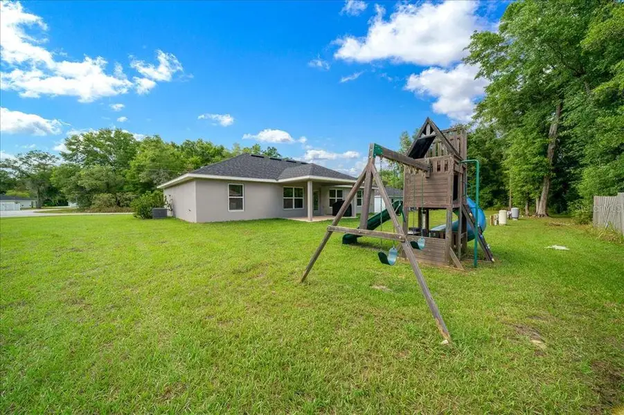 Exterior details and patio area of a home in , Ocala (Image 3).