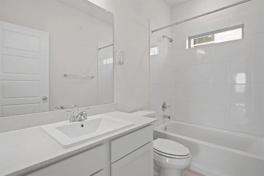 Bathroom in the Pecan II home plan by Trophy Signature Homes – REPRESENTATIVE PHOTO