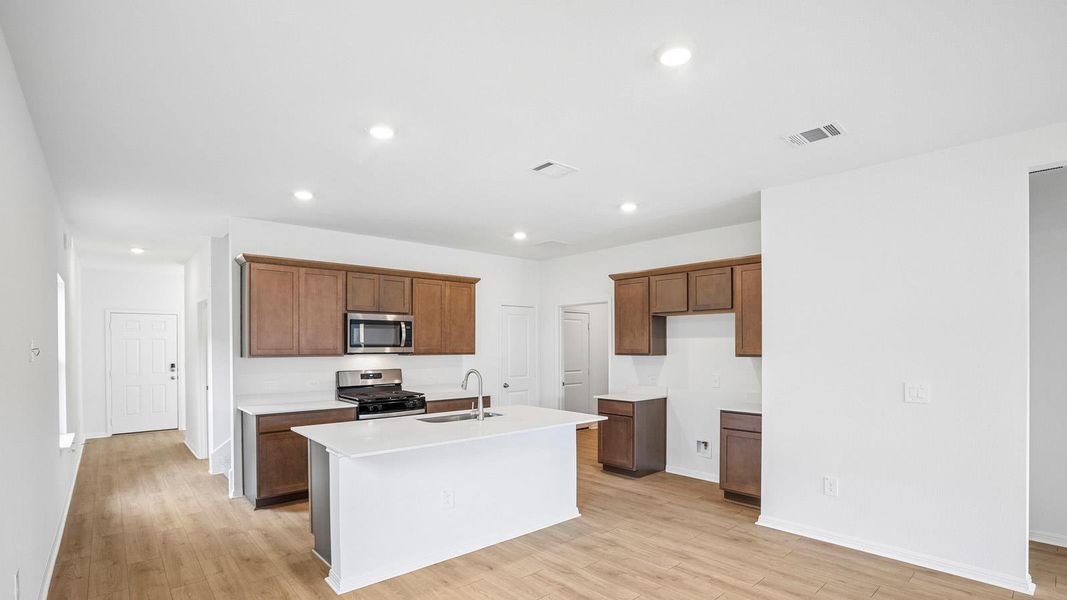 Furnished interior view inside a new home in Bar W Ranch, Leander (Image 4).