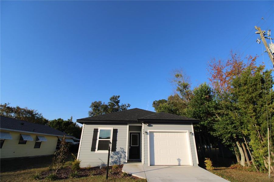 Front exterior of a new home in , Lake City, FL, highlighting curb appeal (Image 1). Front exterior of a new home in , Lake City, FL, highlighting curb appeal (Image 1).