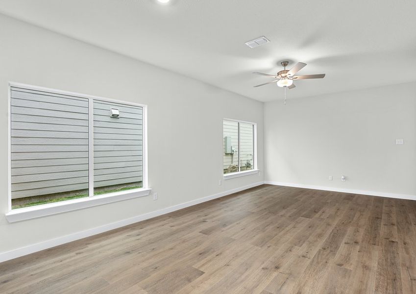 The family room is spacious and has plenty of room for furniture.
