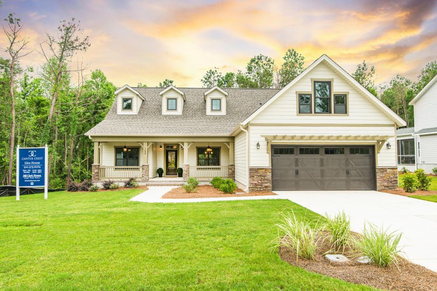 Representative exterior photo of a completed home built from the McKinley by Bill Clark Homes in The Sanctuary at Sunset Beach, Sunset Beach, NC (Image 29). Representative exterior photo of a completed home built from the McKinley by Bill Clark Homes in The Sanctuary at Sunset Beach, Sunset Beach, NC (Image 29).