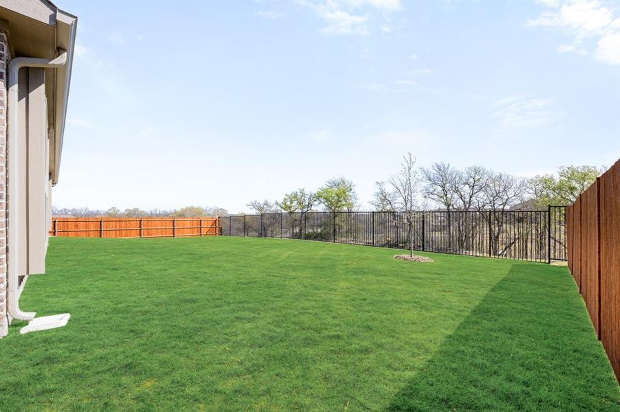 Exterior details and patio area of a home in Timberbrook, Justin (Image 27).