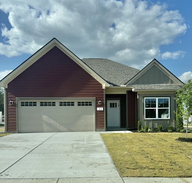 Front exterior of a new home in Stone Fort Meadows, Manchester, TN, highlighting curb appeal (Image 1). Front exterior of a new home in Stone Fort Meadows, Manchester, TN, highlighting curb appeal (Image 1).