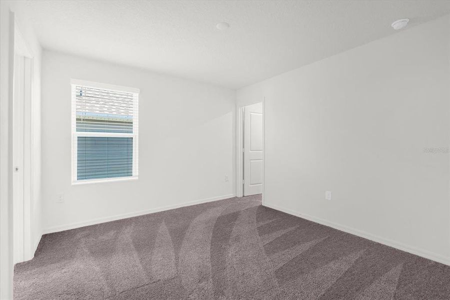 Spacious, unfurnished interior of a new home in Bellaviva III at Westside, Davenport (Image 15).