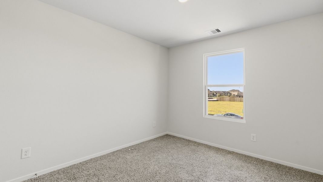 Spacious, unfurnished interior of a new home in Sunterra Lakes, Brookshire (Image 21).