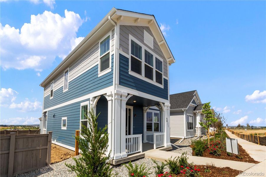 Front exterior of a new home in Westerly, Erie, CO, highlighting curb appeal (Image 1).