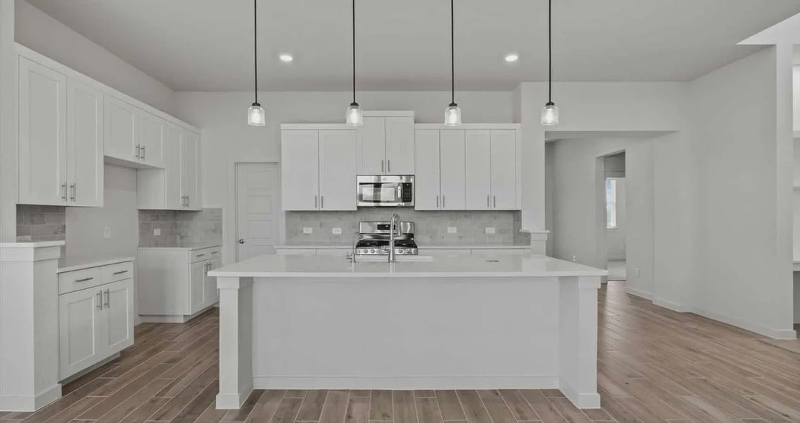 Furnished interior view inside a new home in Stream Waters, Buda (Image 4).