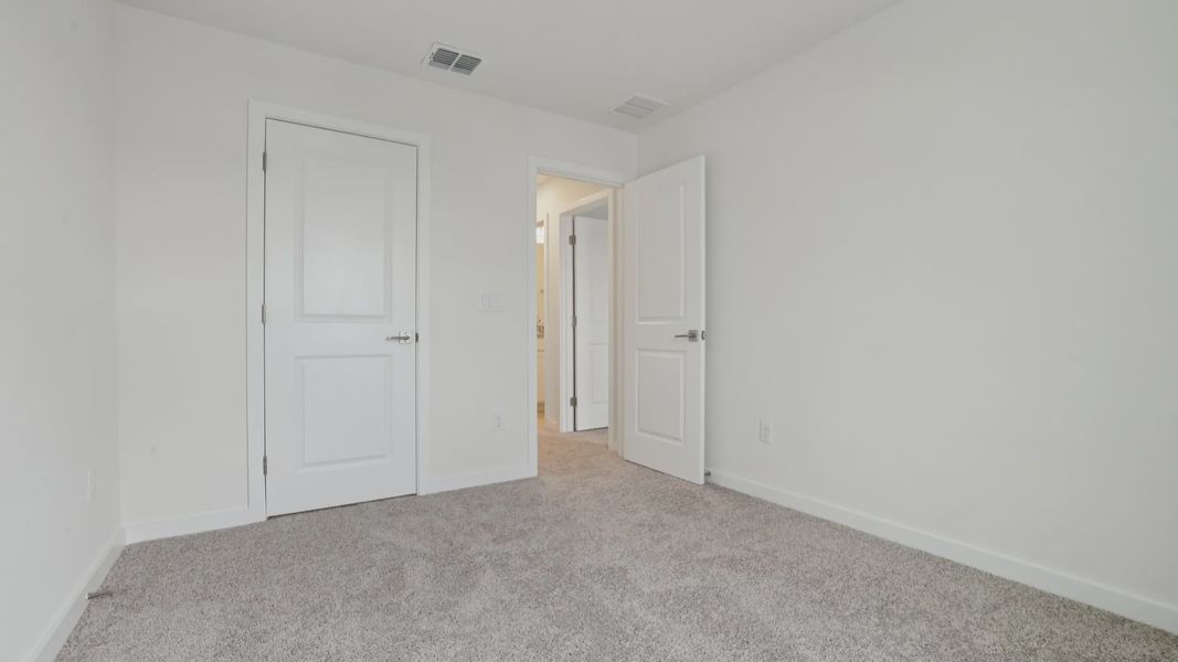 Furnished interior view inside a new home in Cyrene at Harmony, St. Cloud (Image 32).