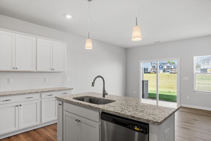 Furnished interior view inside a new home in West Main Townhomes, Sanford (Image 9).