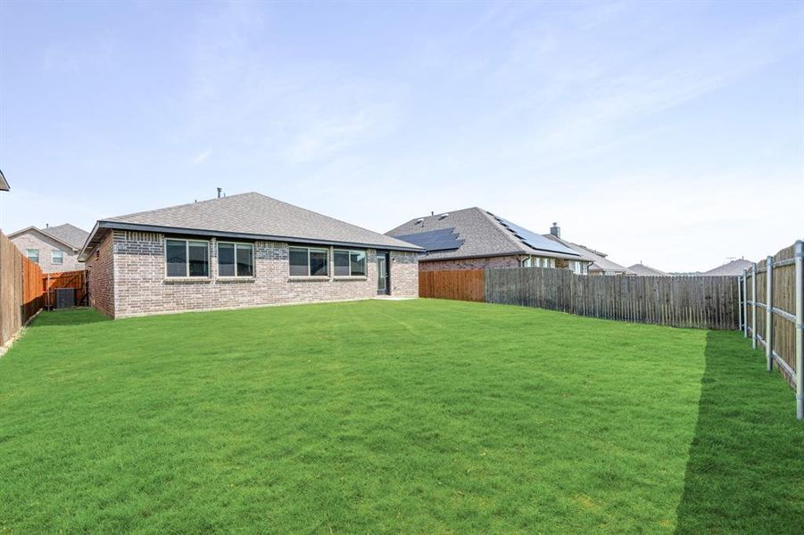 Front exterior of a new home in Godley Ranch Elements, Godley, TX, highlighting curb appeal (Image 22).