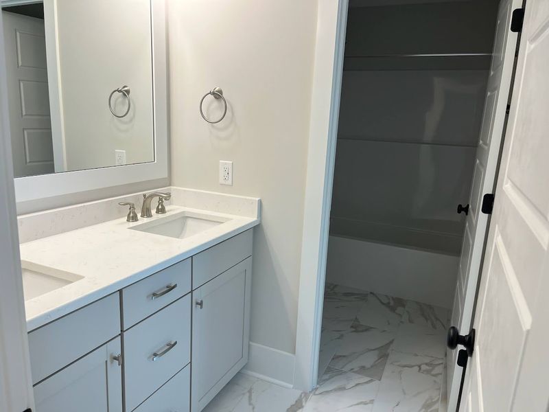 Furnished interior view inside a new home in Osprey Landing, Southport (Image 10).