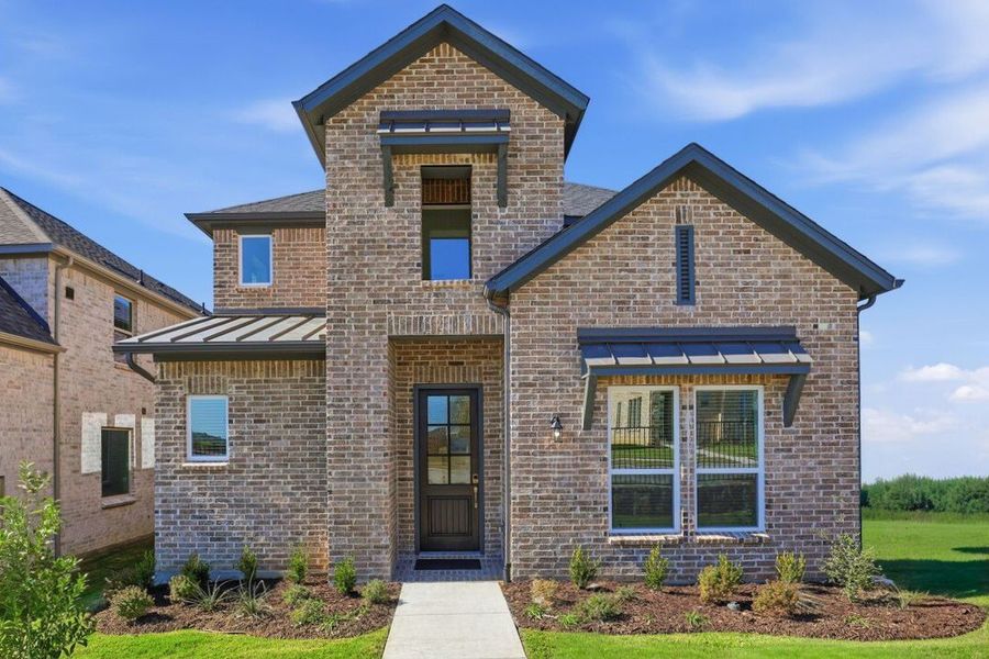 Representative exterior photo of a completed home built from the Lanier by Taylor Morrison in The Ranch at Uptown Celina 40s, Celina, TX (Image 2). Representative exterior photo of a completed home built from the Lanier by Taylor Morrison in The Ranch at Uptown Celina 40s, Celina, TX (Image 2).