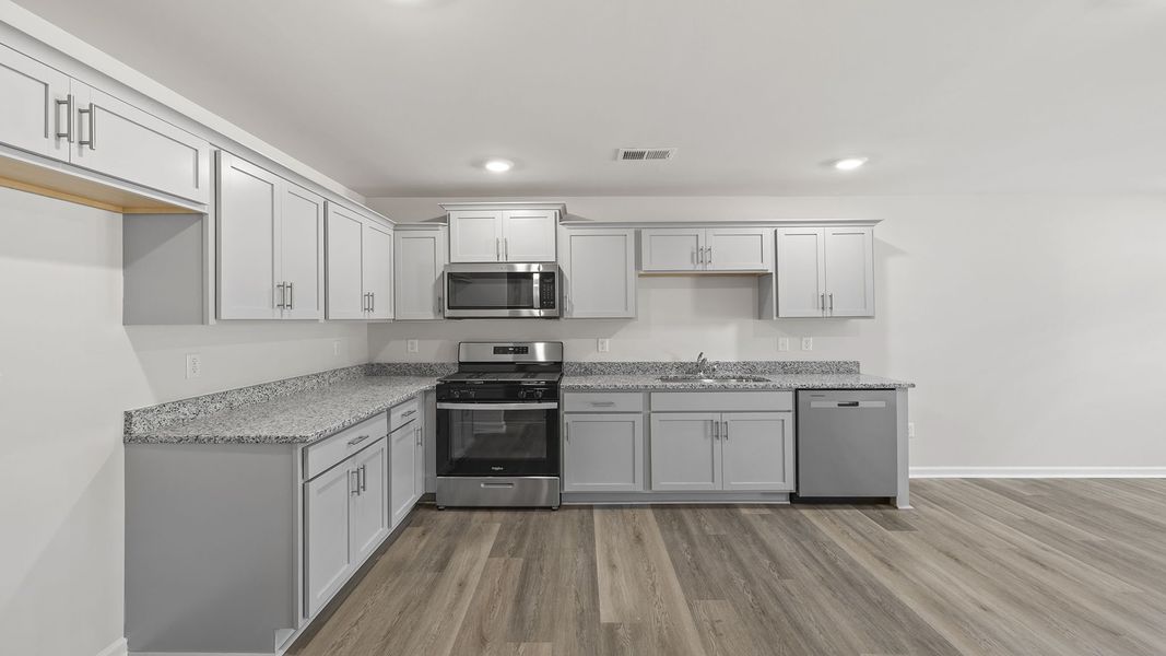 Furnished interior view inside a new home in Village Grove, Greenville (Image 6). Furnished interior view inside a new home in Village Grove, Greenville (Image 6).