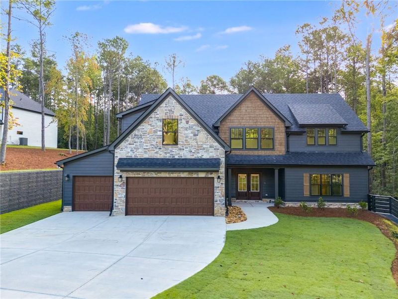 Front exterior of a new home in Liberty Station, Bremen, GA, highlighting curb appeal (Image 26).
