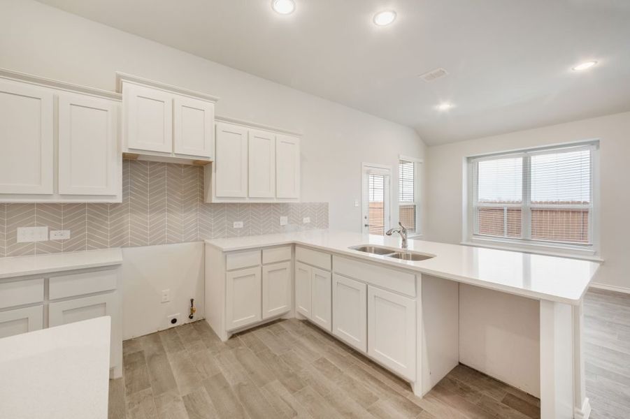 Representative exterior photo of a completed home built from the Joliet by Impression Homes in Heartland, Heartland, TX (Image 8).