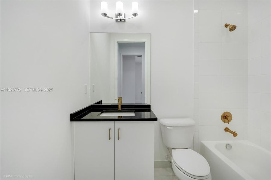 Furnished interior view inside a new home in Lotus Edge, Boca Raton (Image 14).