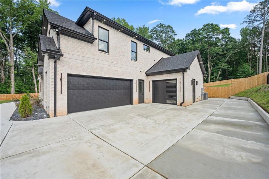 Front exterior of a new home in , Grayson, GA, highlighting curb appeal (Image 28). Front exterior of a new home in , Grayson, GA, highlighting curb appeal (Image 28).
