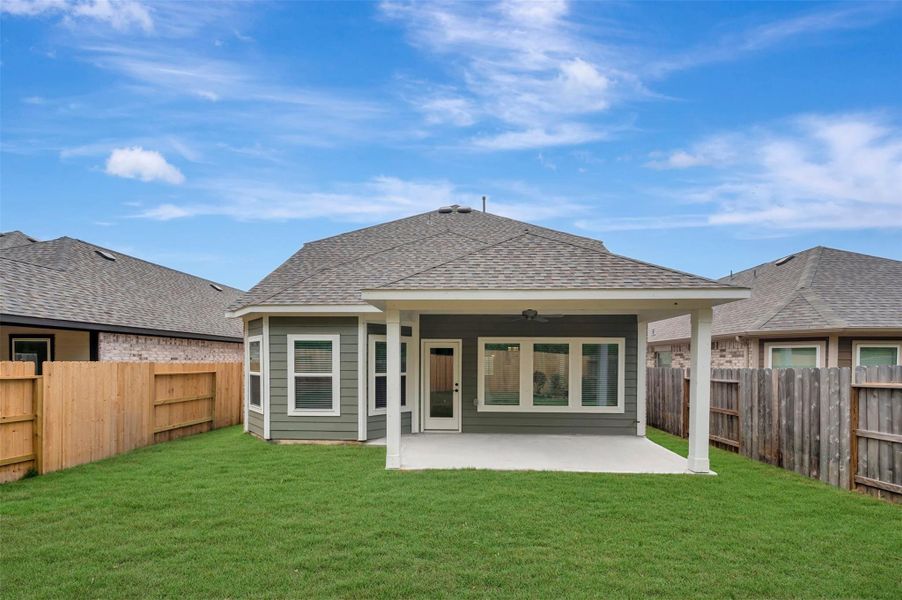Exterior details and patio area of a home in Sorella, Tomball (Image 24).