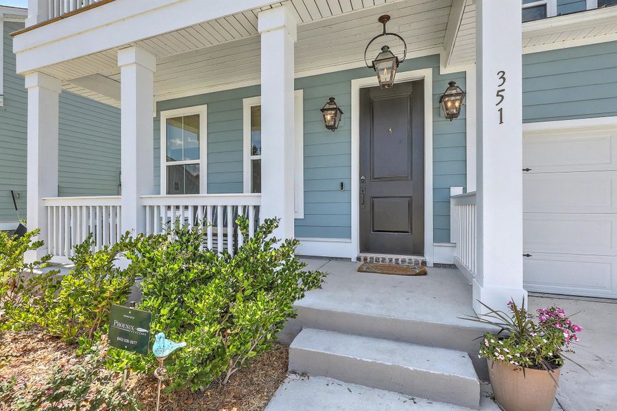 Exterior details and patio area of a home in Tidewater at Lakes of Cane Bay, Summerville (Image 4). Exterior details and patio area of a home in Tidewater at Lakes of Cane Bay, Summerville (Image 4).