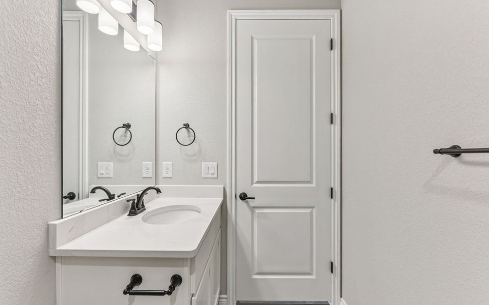 Furnished interior view inside a new home in Kissing Tree, San Marcos (Image 7).