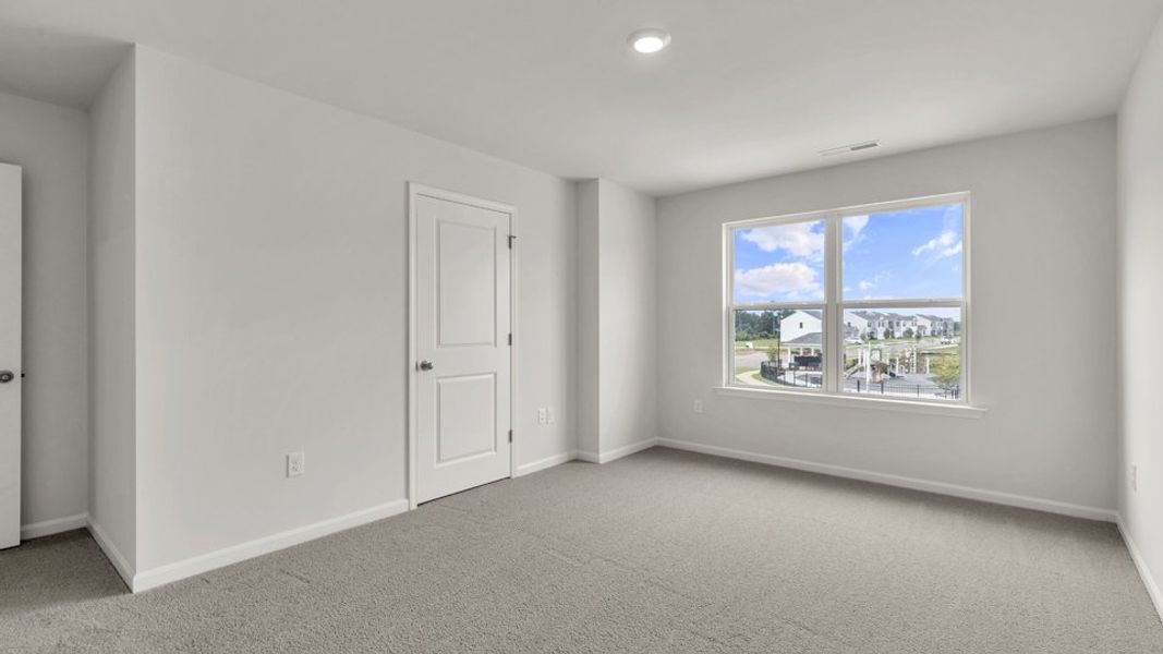 Spacious, unfurnished interior of a new home in The Townes at Wilson's Ridge, Smithfield (Image 22).