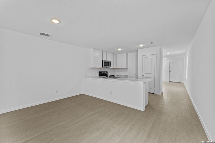 Spacious, unfurnished interior of a new home in Hidden Oasis, San Antonio (Image 26). Spacious, unfurnished interior of a new home in Hidden Oasis, San Antonio (Image 26).