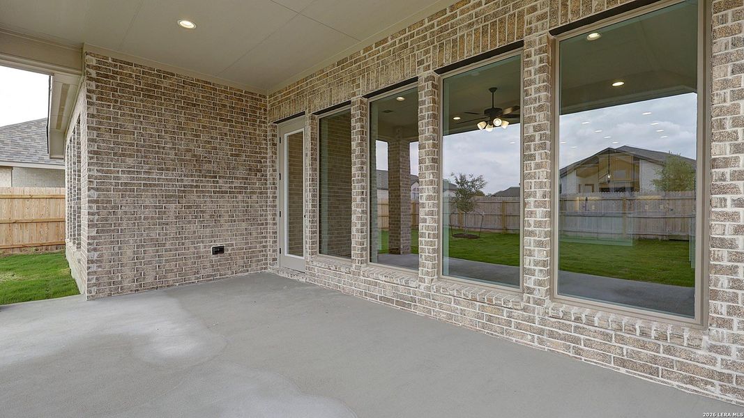 Exterior details and patio area of a home in Alsatian Oaks, Castroville (Image 3).