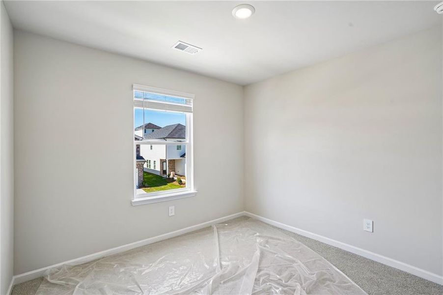 Spacious, unfurnished interior of a new home in Hawthorne Station, College Park (Image 22).