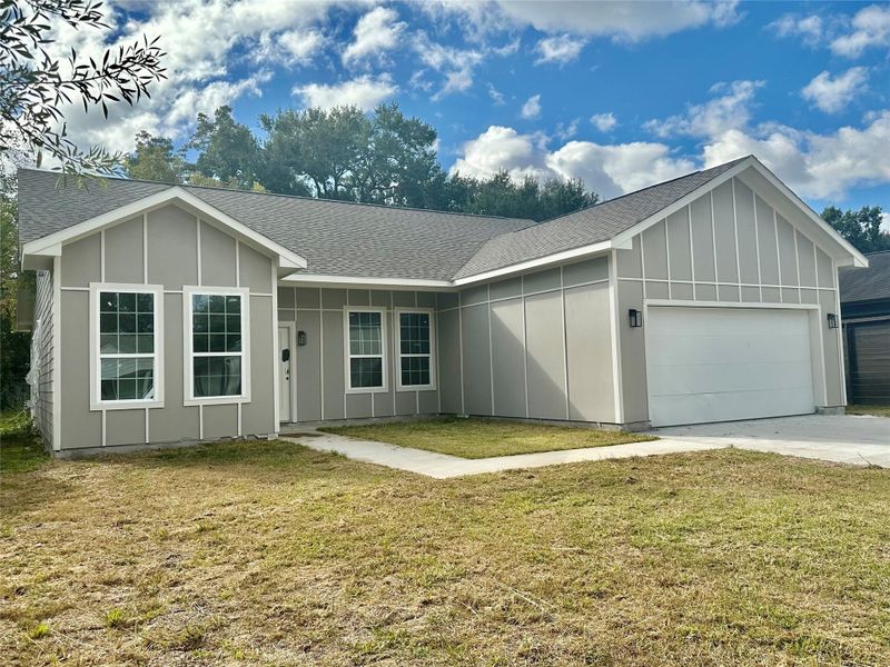 Front exterior of a new home in , Houston, TX, highlighting curb appeal (Image 4).