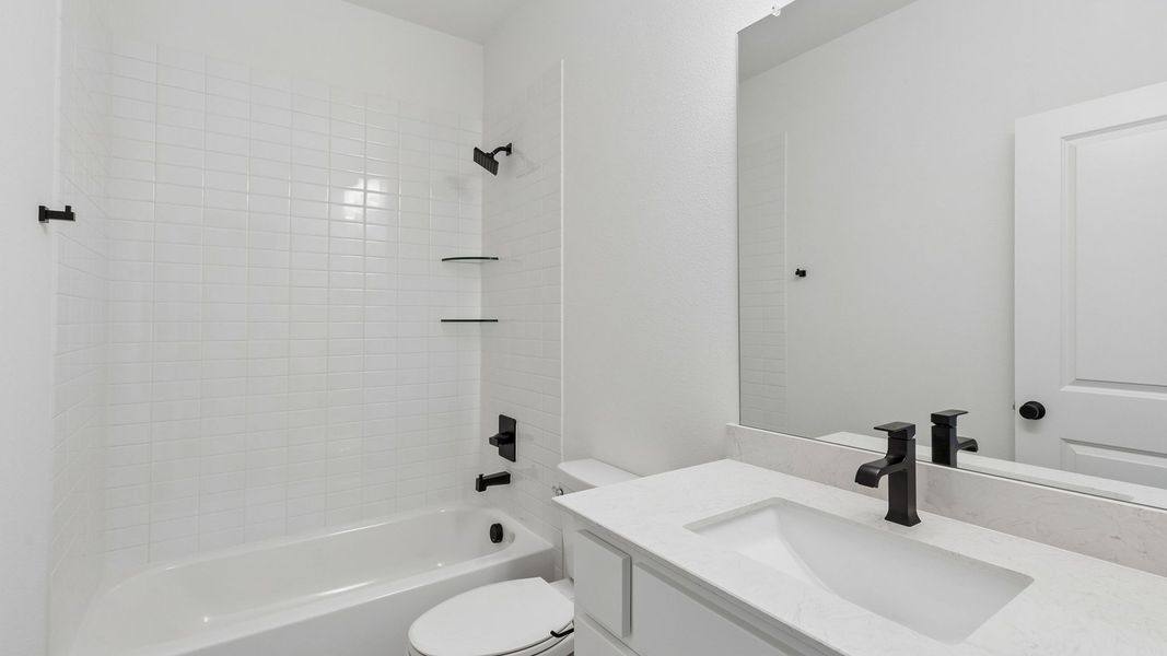 Representative furnished interior of a home built from the Custom II by Southgate Homes in Prosper Ridge, Prosper (Image 10).