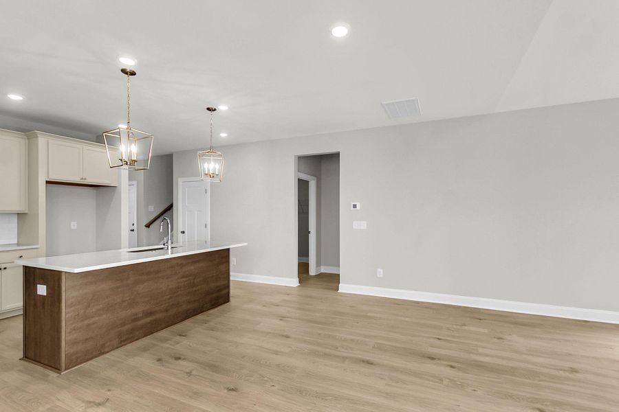 Spacious, unfurnished interior of a new home in Tidewater at Lakes of Cane Bay, Summerville (Image 24).