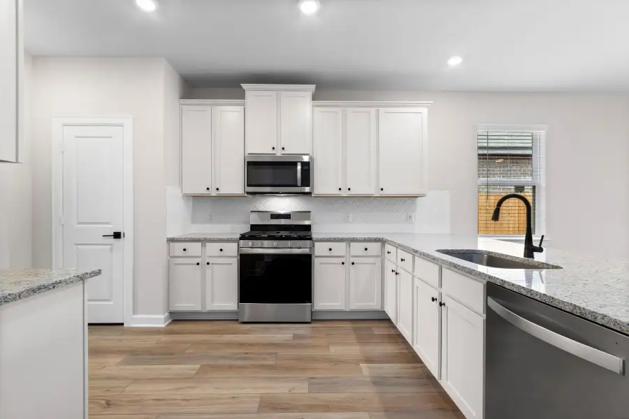 Furnished interior view inside a new home in Emberly, Beasley (Image 4).
