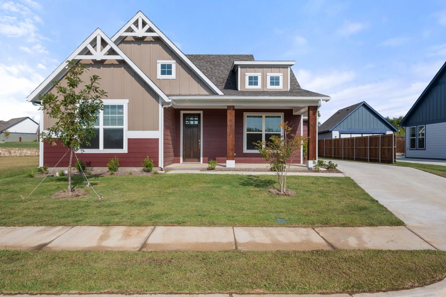Front exterior of a new home in Heritage Towne, Midlothian, TX, highlighting curb appeal (Image 20). Front exterior of a new home in Heritage Towne, Midlothian, TX, highlighting curb appeal (Image 20).