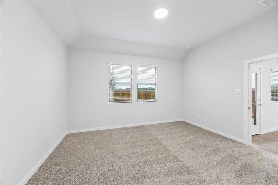 Primary Suite in the Cedar home plan by Trophy Signature Homes – REPRESENTATIVE PHOTO