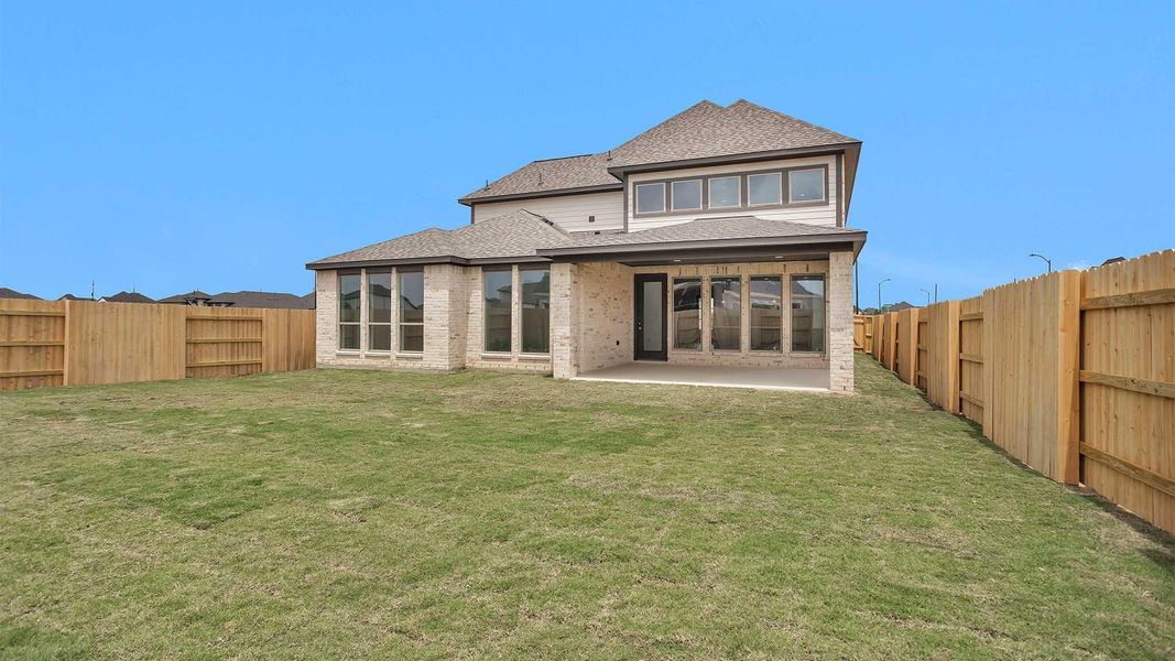 Exterior details and patio area of a home in Elyson, Katy (Image 3). Exterior details and patio area of a home in Elyson, Katy (Image 3).