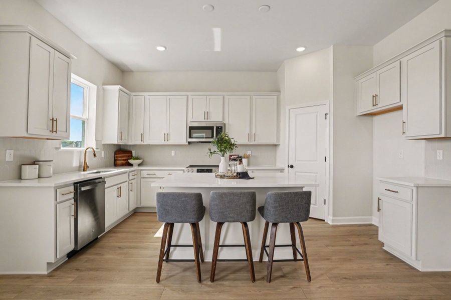 Representative furnished interior of a home built from the Sedona - Waterway by Ashton Woods in Blue Heron Retreat, Little River (Image 6).