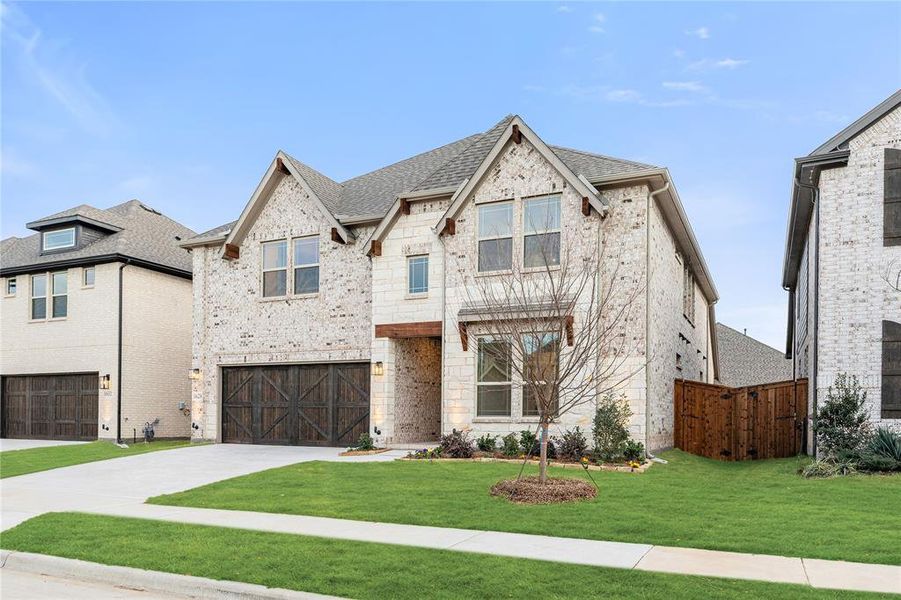 Front exterior of a new home in Willow Wood, McKinney, TX, highlighting curb appeal (Image 2).
