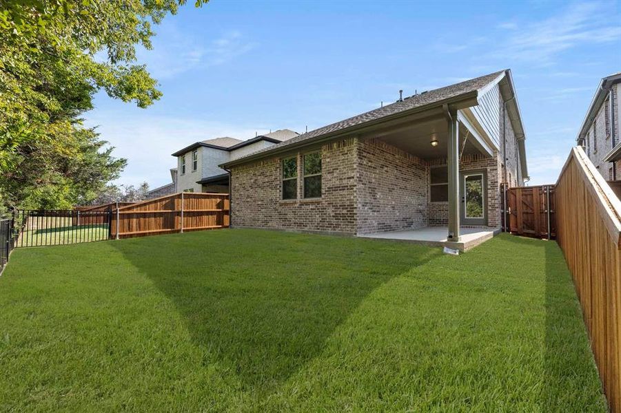 Exterior details and patio area of a home in Devonshire 40s, Forney (Image 3). Exterior details and patio area of a home in Devonshire 40s, Forney (Image 3).