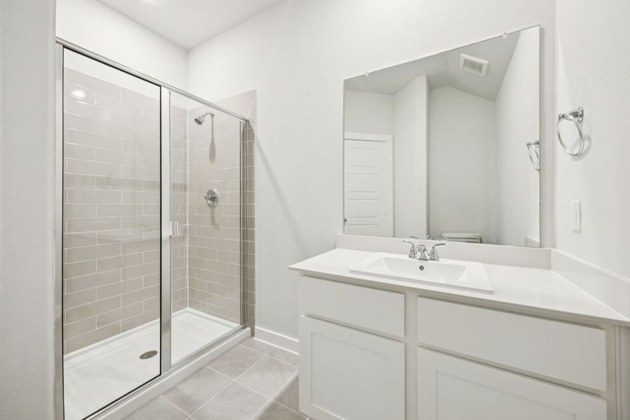 Bathroom in the Masters home plan by Trophy Signature Homes – REPRESENTATIVE PHOTO Bathroom in the Masters home plan by Trophy Signature Homes – REPRESENTATIVE PHOTO