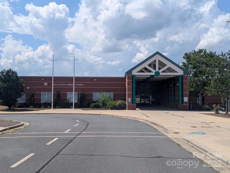 Front exterior of a new home in , Locust, NC, highlighting curb appeal (Image 17). Front exterior of a new home in , Locust, NC, highlighting curb appeal (Image 17).